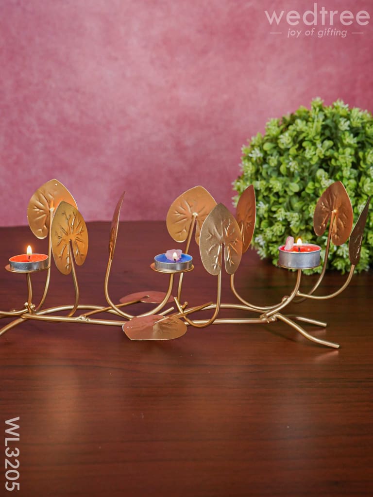 Candle Holders among Lotus Stems & Leaves