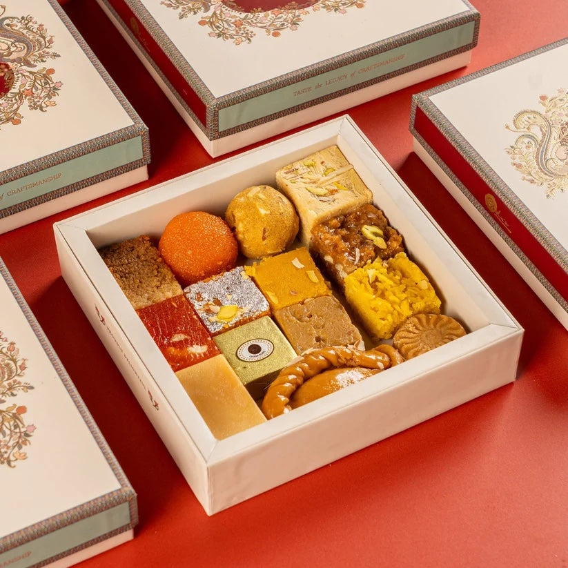 Corporate Signature Diwali Box, open cream and gold presentation box of assorted Indian sweets, sent from India with your company logo