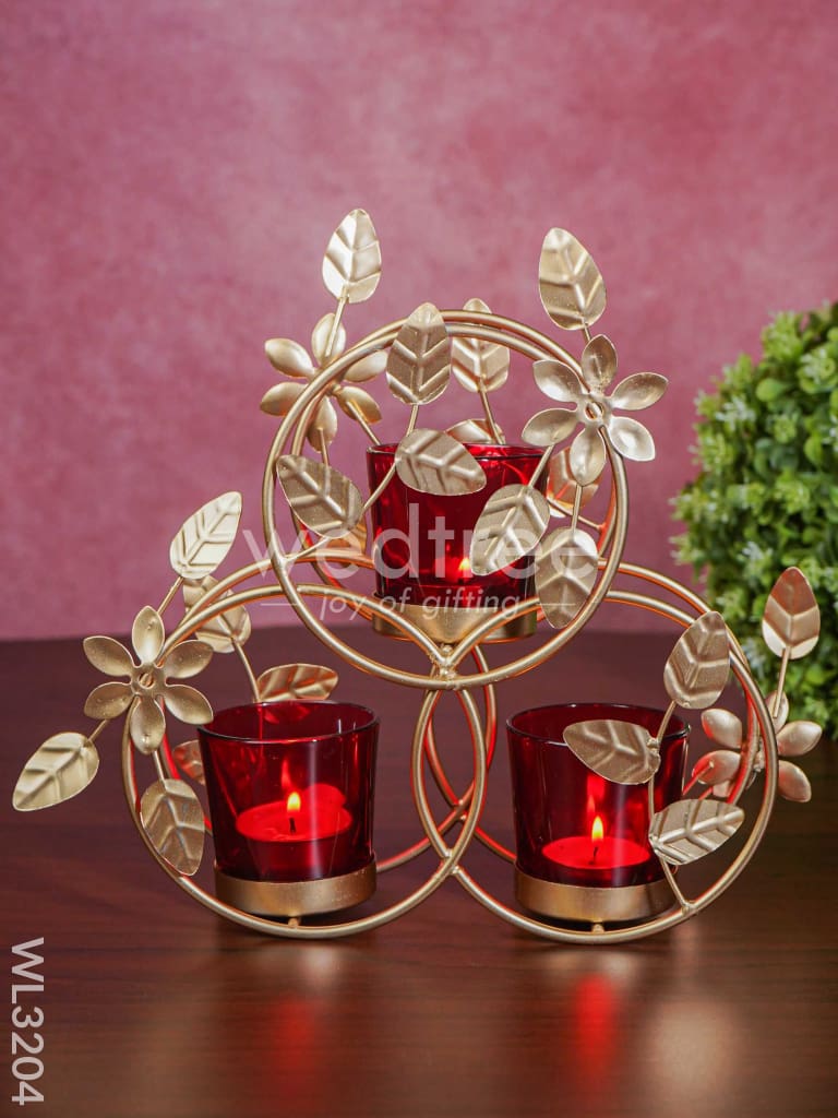 Leaves & Flowers Metal T Light Holder with a Radiating Red Glass