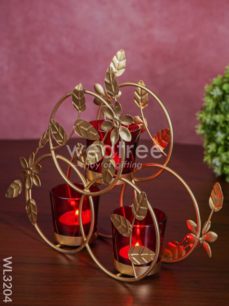 Leaves & Flowers Metal T Light Holder with a Radiating Red Glass