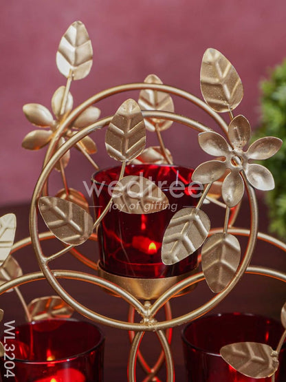 Leaves & Flowers Metal T Light Holder with a Radiating Red Glass