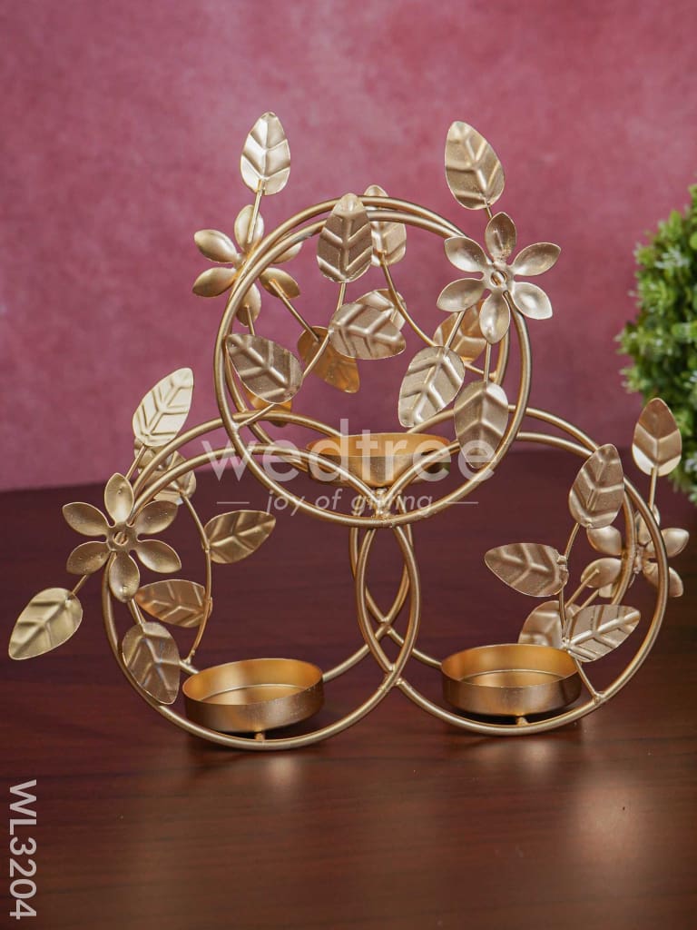 Leaves & Flowers Metal T Light Holder with a Radiating Red Glass