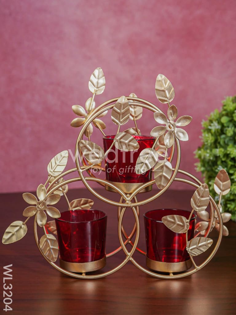 Leaves & Flowers Metal T Light Holder with a Radiating Red Glass