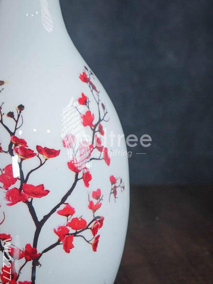 Metal vase in White colour with floral design