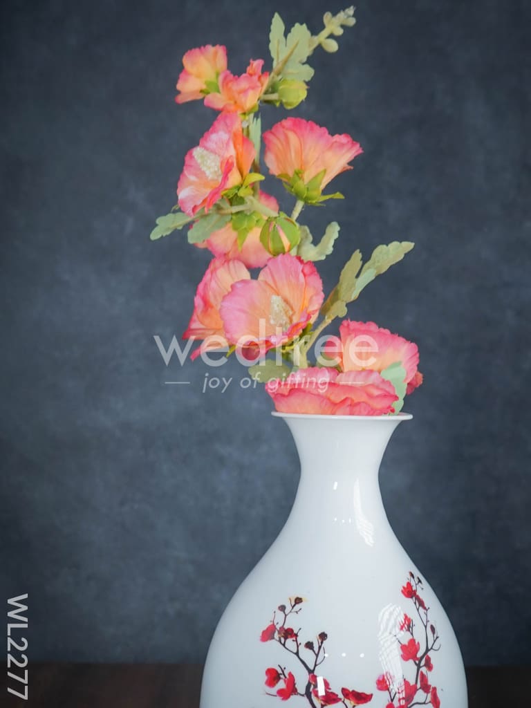 Metal vase in White colour with floral design