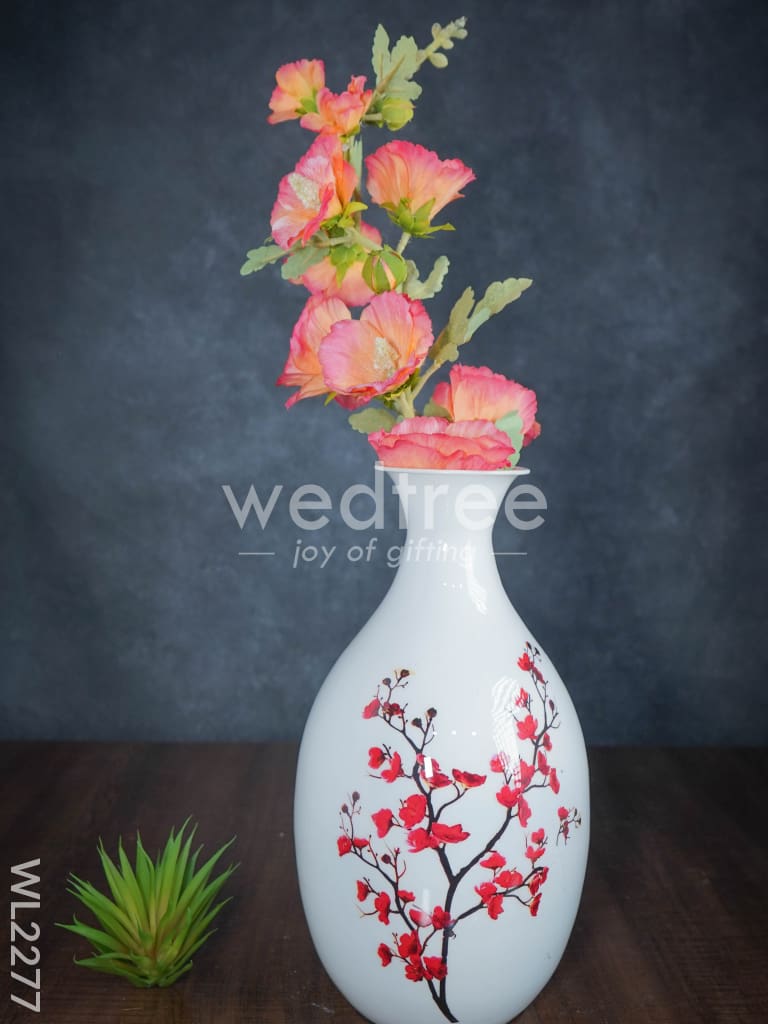 Metal vase in White colour with floral design