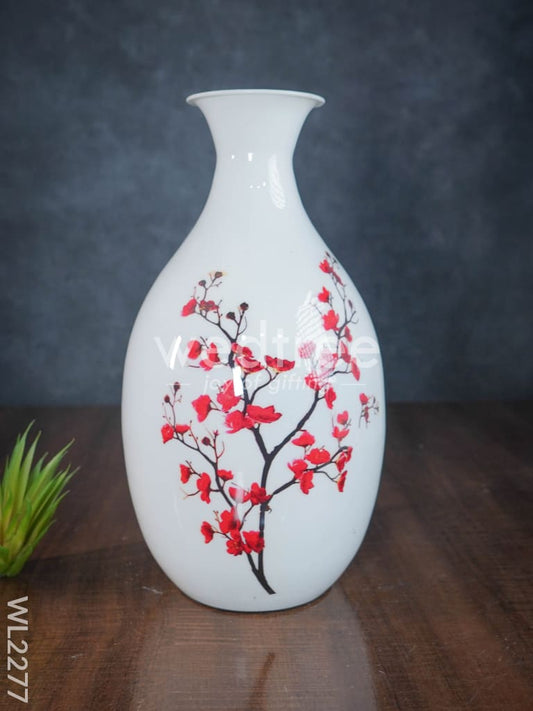 Metal vase in White colour with floral design