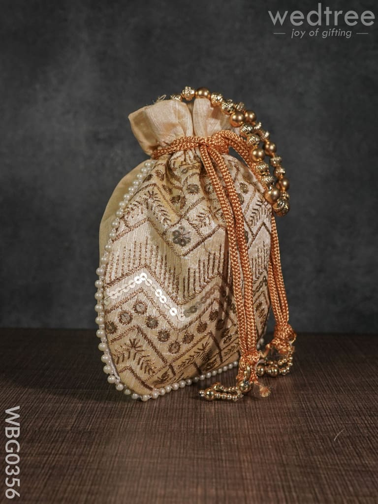 Potli Bag with Golden Decorative Embroidery