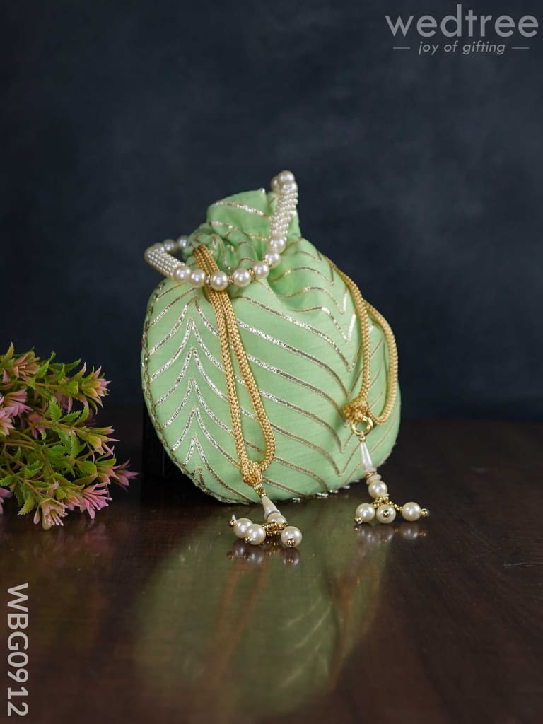 Potli Bag with Golden Lace Work