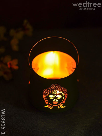 Votive with Buddha Design