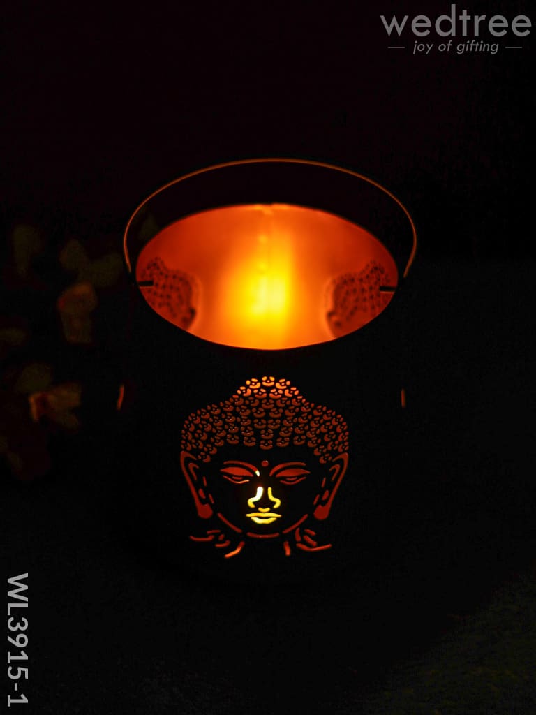 Votive with Buddha Design