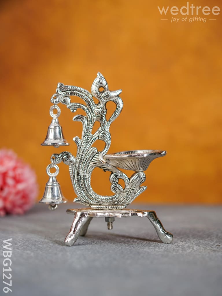 White Metal Chowki with Diya & Hanging Bells