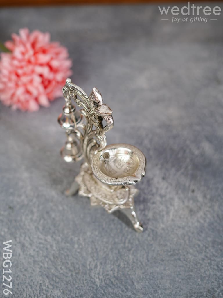 White Metal Chowki with Diya & Hanging Bells