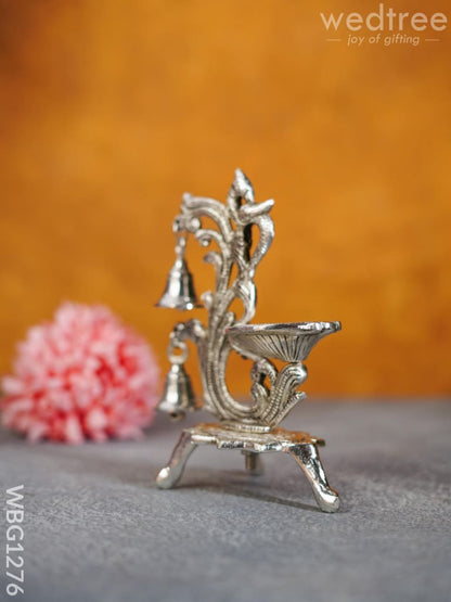 White Metal Chowki with Diya & Hanging Bells