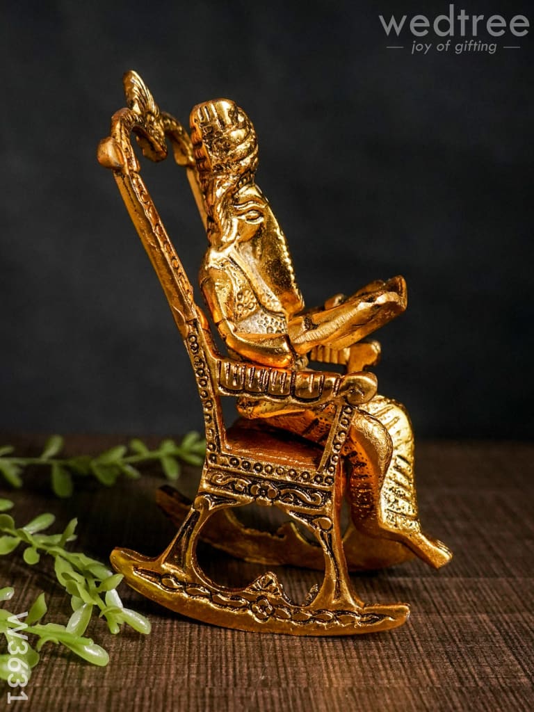 White metal Ganesha on chair Gold Finish