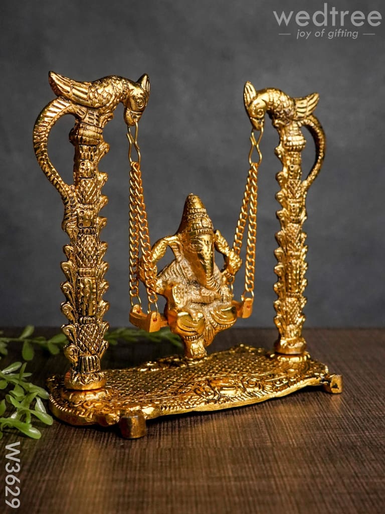 White Metal Ganesha on Swing gold Finish