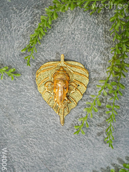 White Metal Wall Hanging Ganesha face on leaf  - Gold Finish