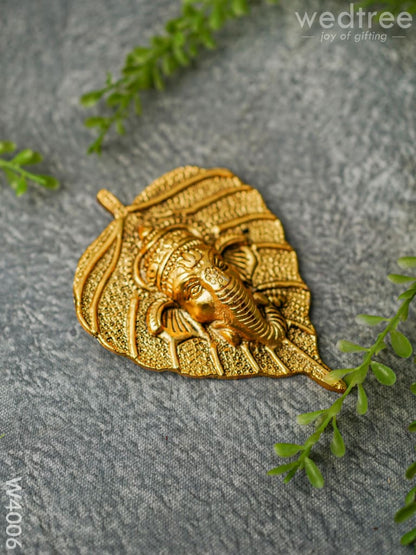 White Metal Wall Hanging Ganesha face on leaf  - Gold Finish