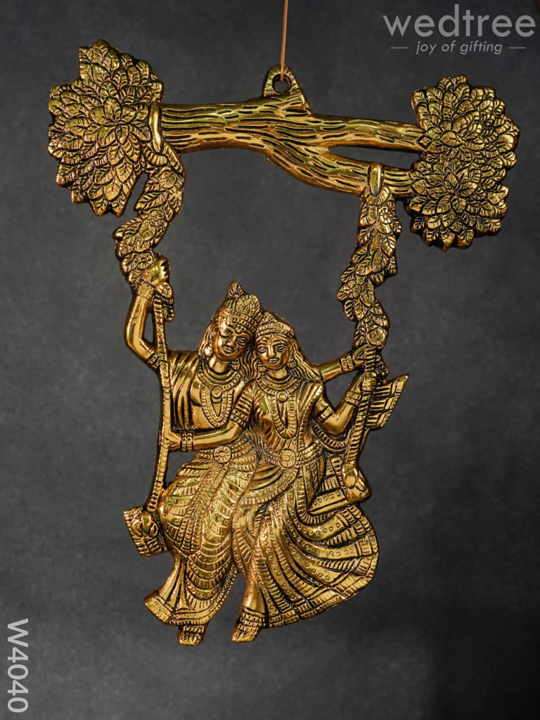 White metal wall hanging radha krishna on swing under tree